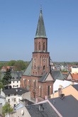 The majestic tower of the 13th-c. Elevation of the Holy Cross Parish Church in   Sulechów